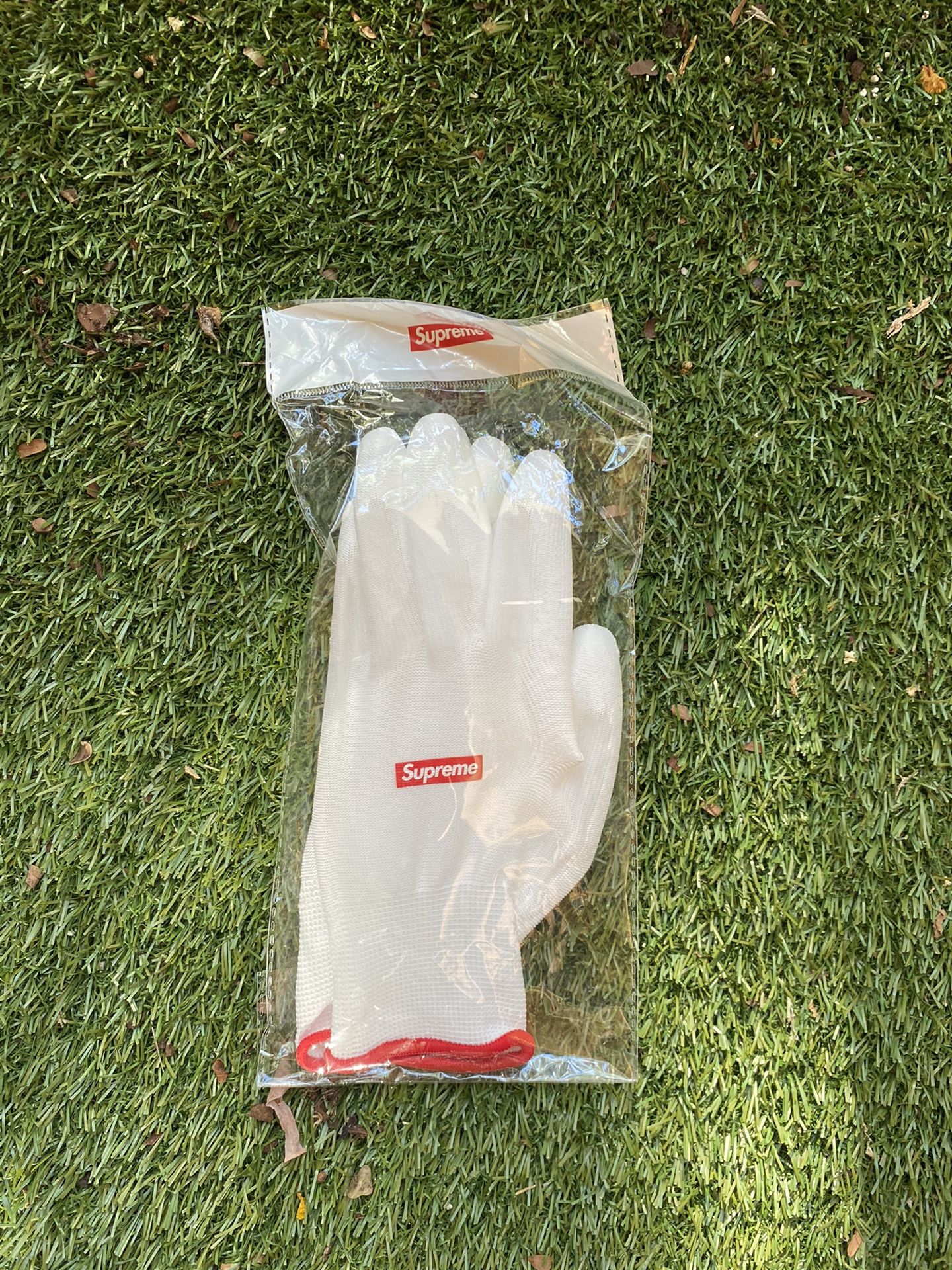 Supreme rubberized gloves